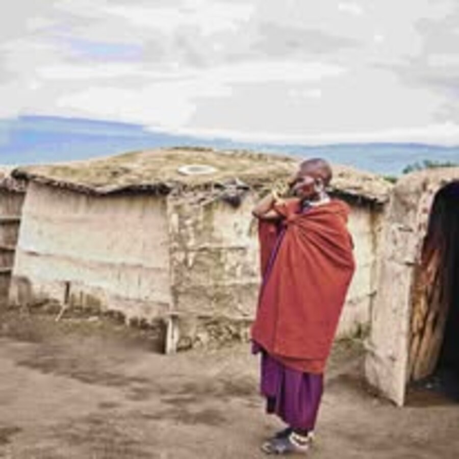 Maasai man in village