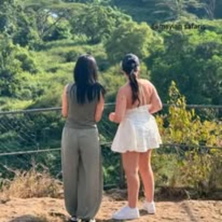 Tourists enjoying a valley viewpoint in Kenya